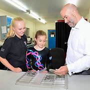 Steve shows the girls some finished concepts