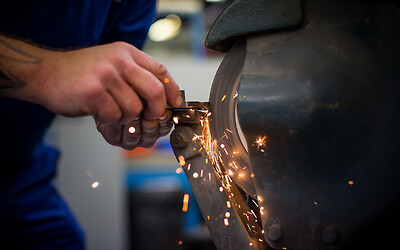 Re-sharpening a tool on the offhand grinder - look after your tools!