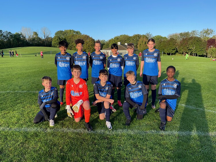 MK United Lions in their new home kit sponsored by The Engineering Quest